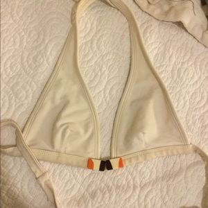 Cream colored bikini top with cute orange  detail
